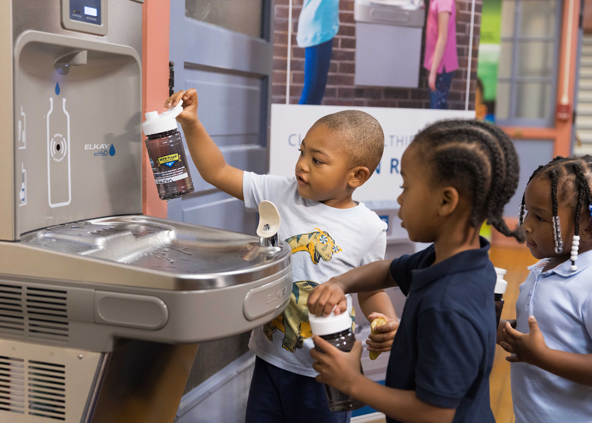 Starms students use their new Elkay bottle filling station