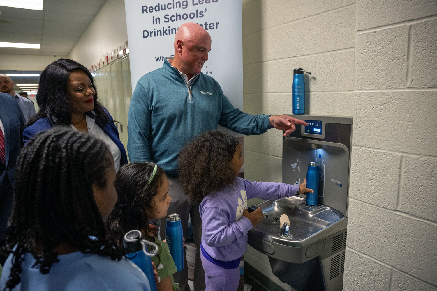 Todd Adams, Chairman and CEO, with JoAnna Connell students